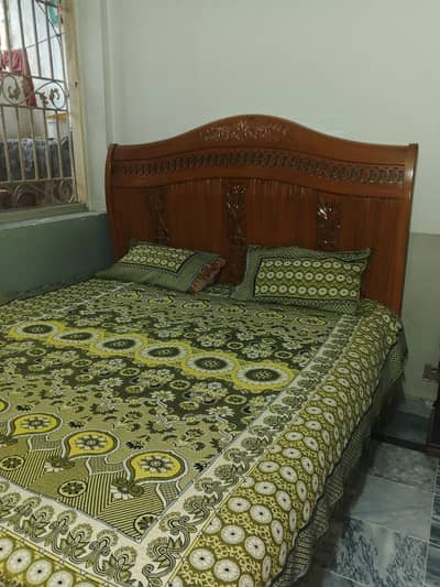 solid wooden bed