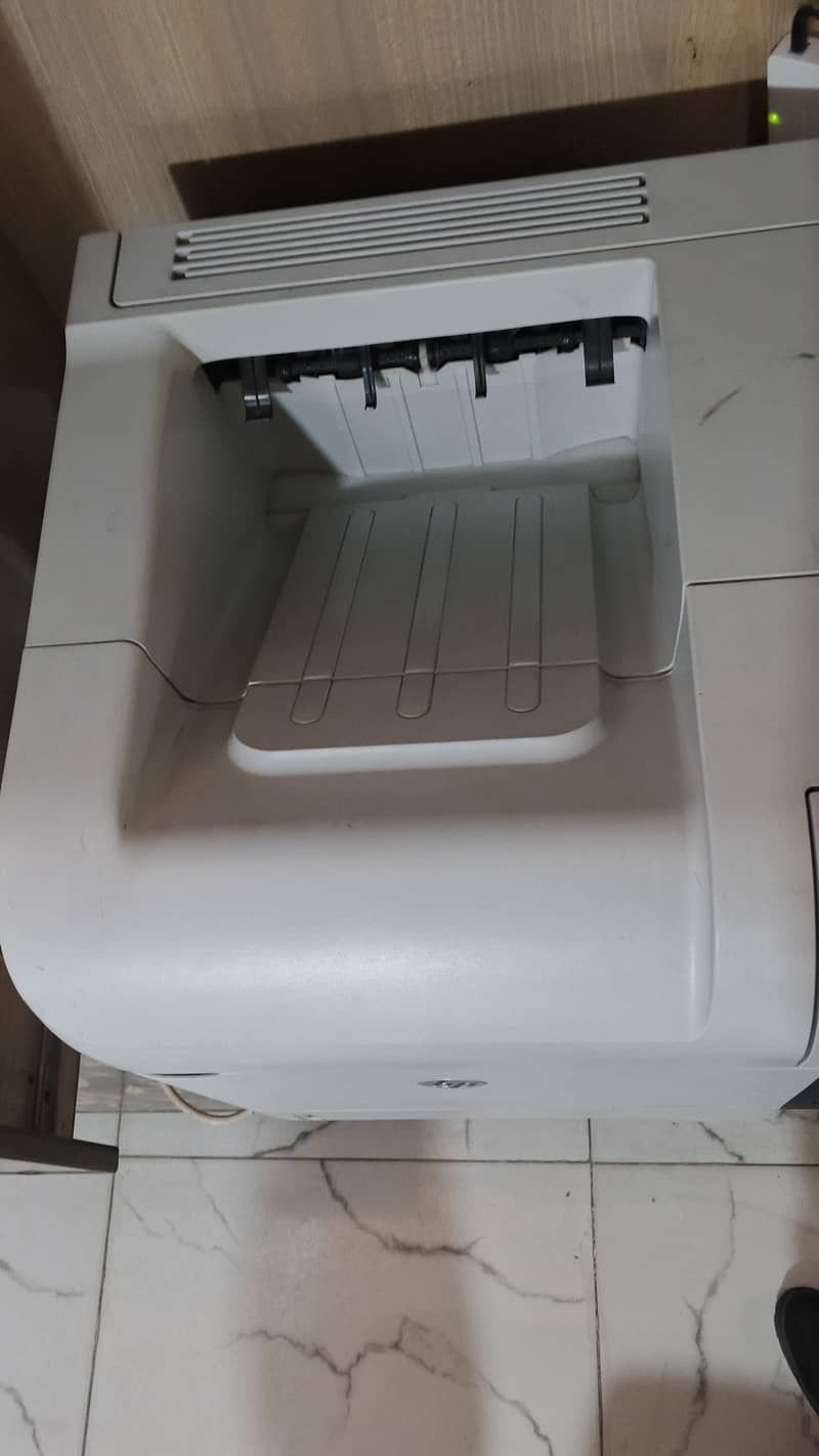 HP M602 1