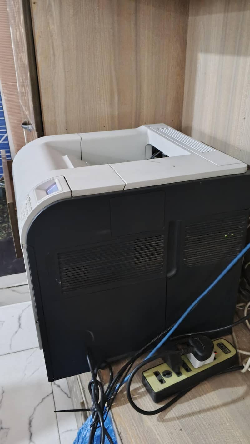 HP M602 3