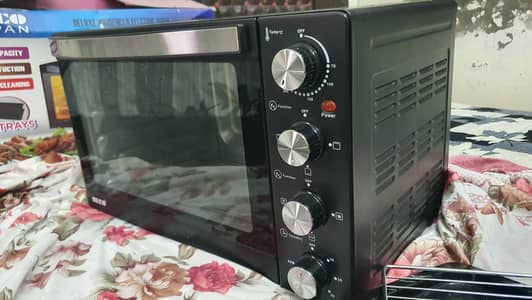 best 70 Ltr  backing oven in warranty