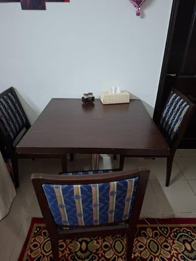 Dining table with 4 chairs.
