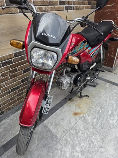Honda Cd 70 dream, 2023 model, red color