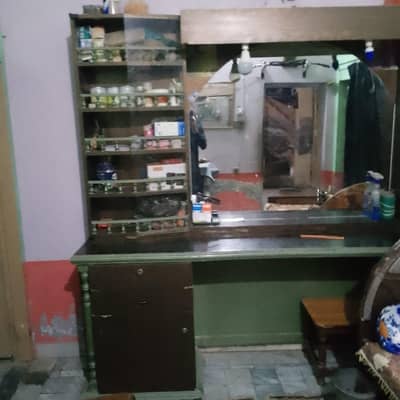 beauty saloon for sale which consists one big mirror counter and chair