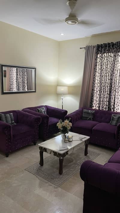 Sofa set with table, lamp, wall mirror, rug and artificial plant