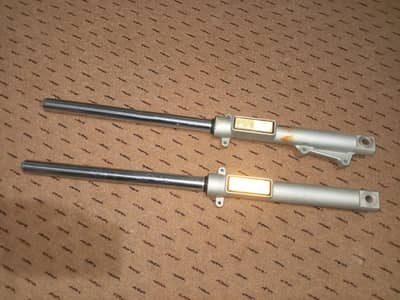 Honda deluxe 125 shooks available