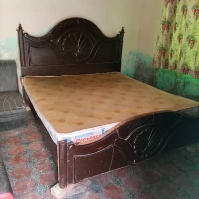 this is double bed  with mattress and 2 sites tables