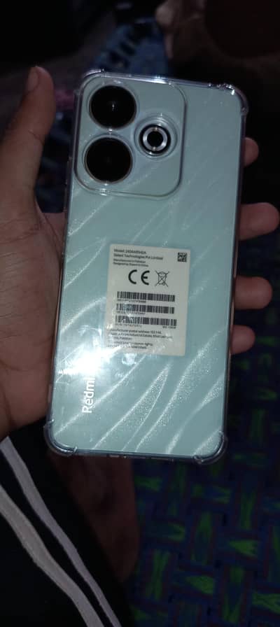 Redmi 13 8+128/10/9.5 condition neche bs ek chota dent Hy penel py nhi