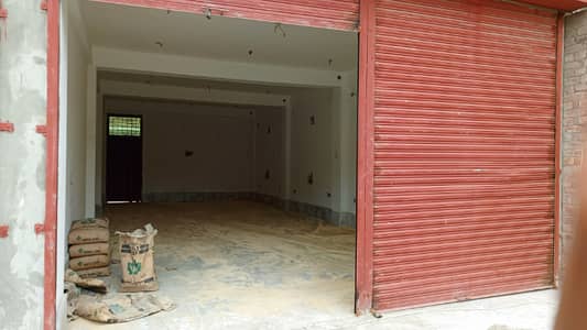 Shop for rent model town link road best for restaurant pizza shop and brand shop garments and shoes shop