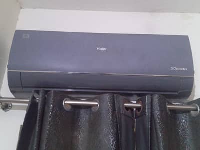 new one month used only haier T 3 DC inverter for urgent sale