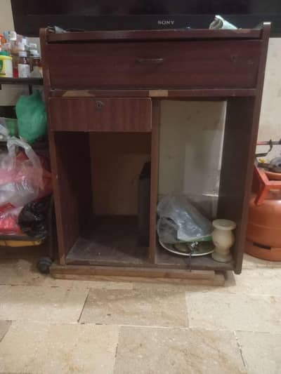BROWN CUPBOARD, WALL CLOCK, JUICER MACHINE