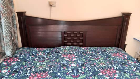 used king size bed with side table