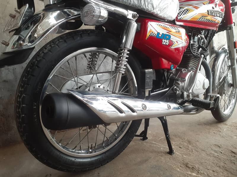 UNIQUE 125 11