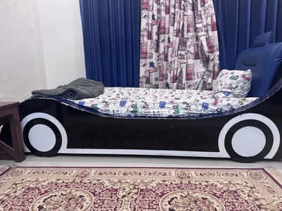 Single bed with side table