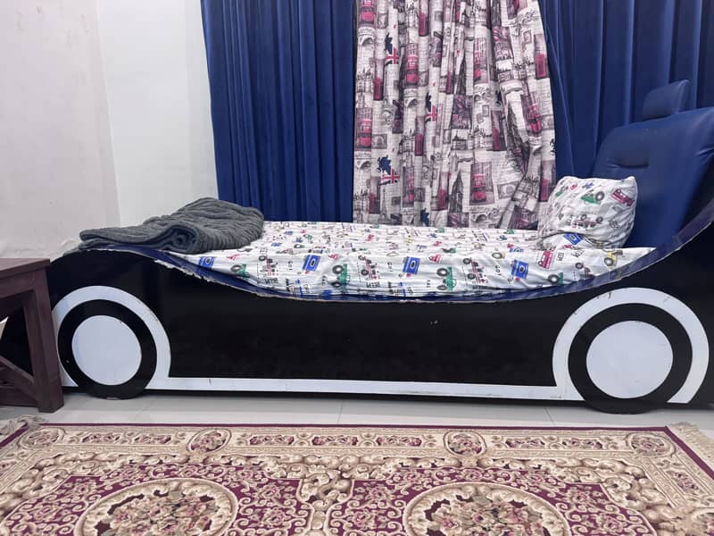 Single bed with side table 0