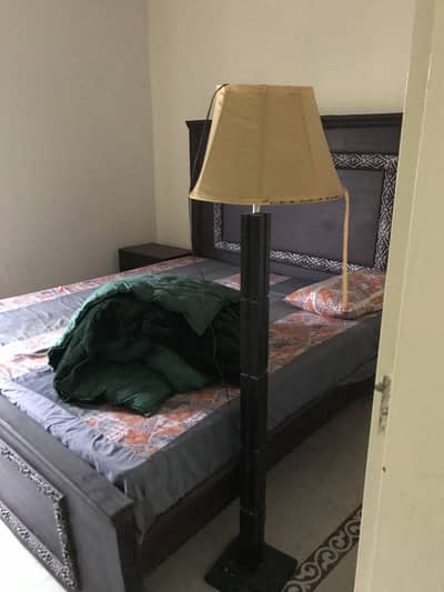 One Double bed with mattress and one site table only