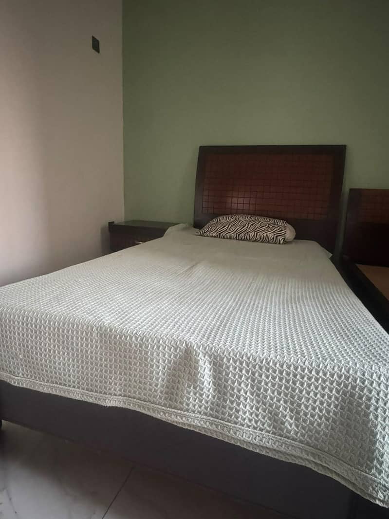 Single bed and side tables 0