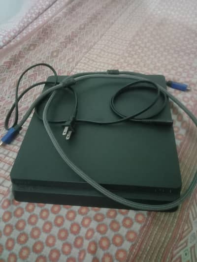 Playstation 4 slim with controller
