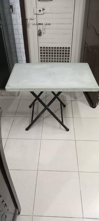 Folding table and 4 chairs.
