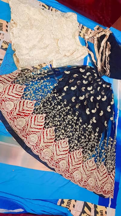 black and red shrara with golden shirt