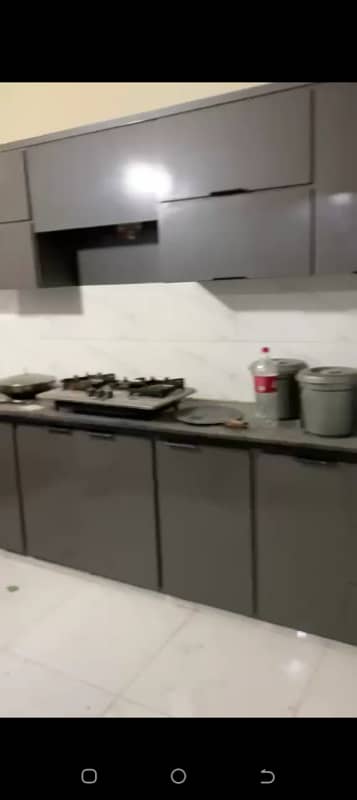 Newly renovated 2bed drawing lounge 2nd floor maymar plaza flate for rent tiled flooring America kitchen tiled washrooms 24 hours water and electricity boundary wall project