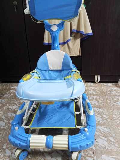 Baby walker 10/9 condition just one month used contact only serious b