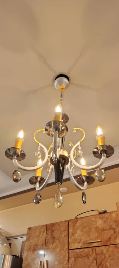 2 Chandelier 3 wall light condition used like new urgent sale