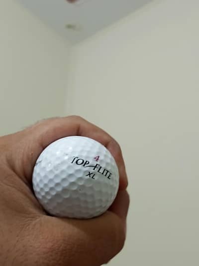 golf ball hockey ball