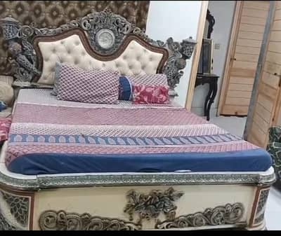 1 Bed without mattress, two side tables , dressing mirror,
