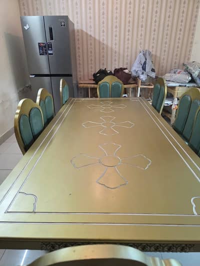 Wooden dinning table and chairs