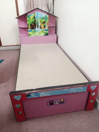 girl's pink bed with matching side table| kids bedroom furniture