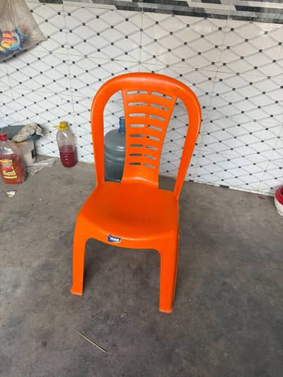 orange colour plastic chair X 8 chairs