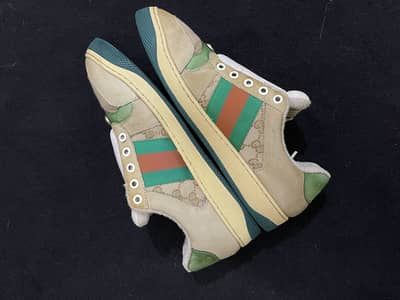 Gucci Screener Monogrammed Canvas