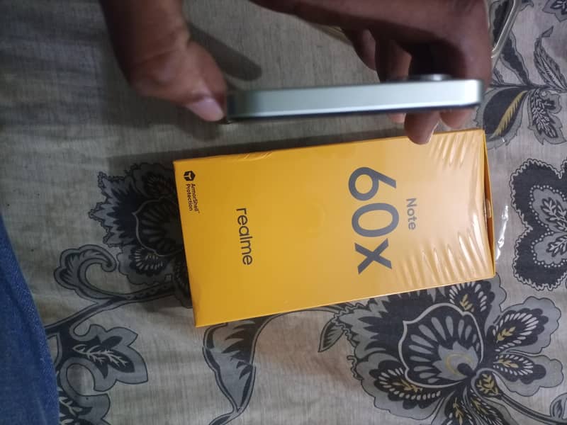 Realme Note 60 7