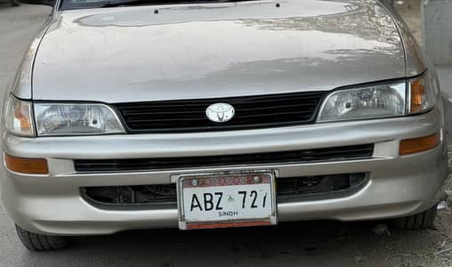 Indus Corolla front lights, fresh bumper and grill