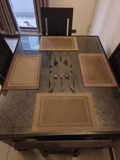 four chairs and dining table for sale