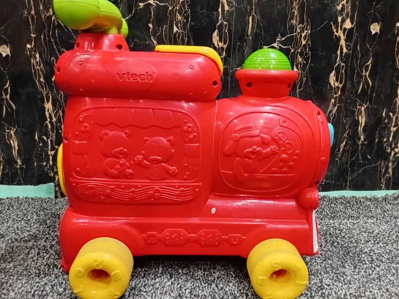 V Tech Push Walker Ride on 4