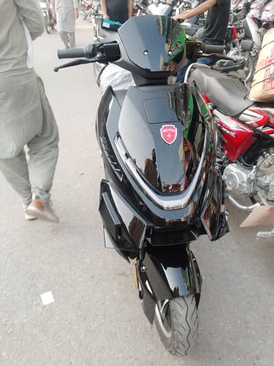 electric scooty 115 kilometre