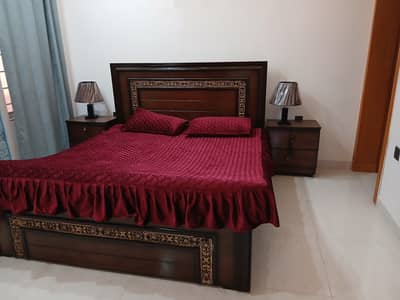 king bed with side tabke and mattress