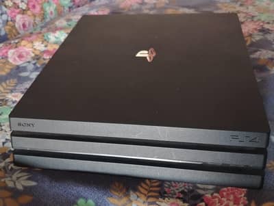 PS4 Pro 1TB with 2 controllersand and 5 games