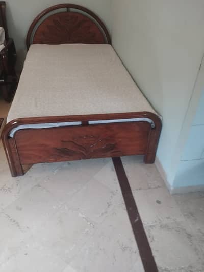Used wooden single beds