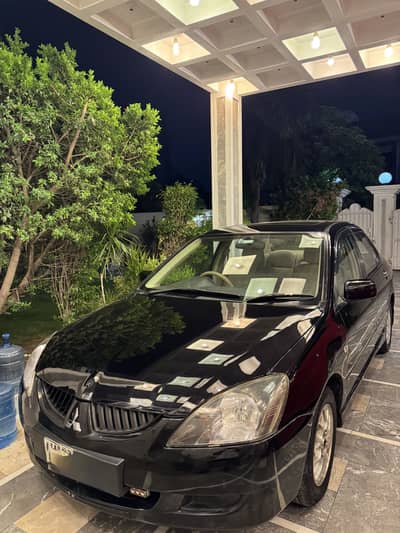 Mitsubishi Lancer 2006 fully loaded. 1600 cc auto