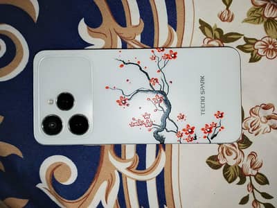 Tecno Spark 40.8/128.4 month warranty available