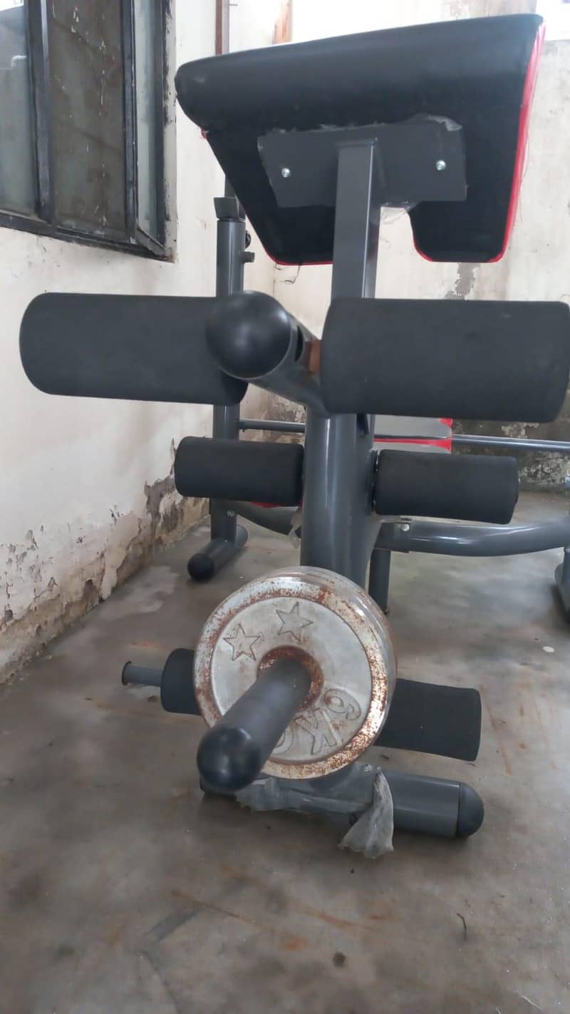 Exercise bench + Barbells diffrents size. 1