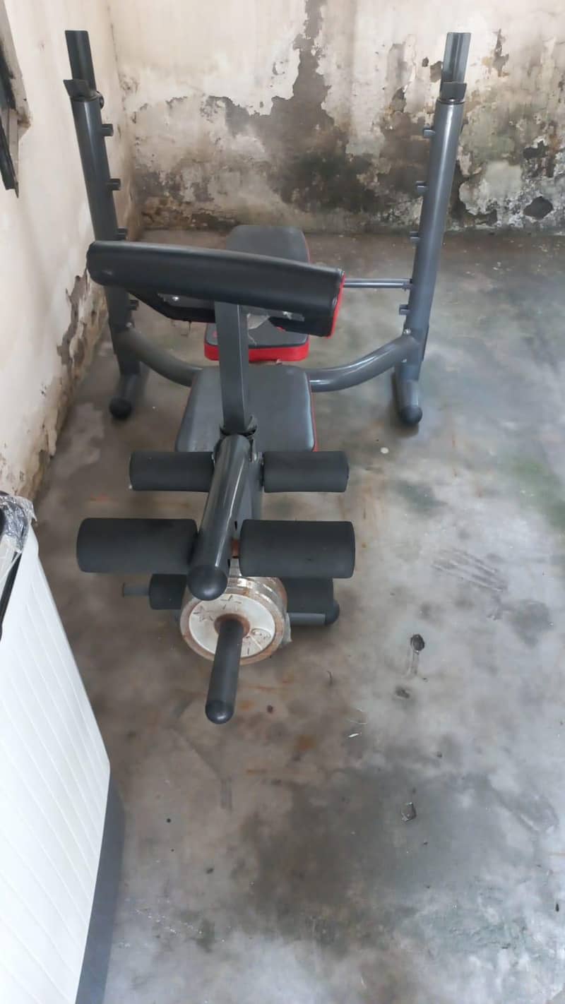 Exercise bench + Barbells diffrents size. 4