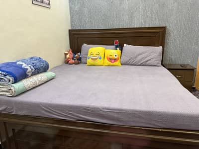 Bed with side table and foam