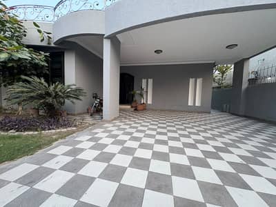 AC Installed 1 Kanal Slightly Used Modern Design House For Rent In DHA Phase 4 Lahore.