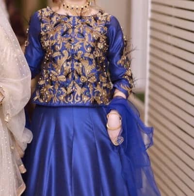 Silk with stone work with peacock leaves
