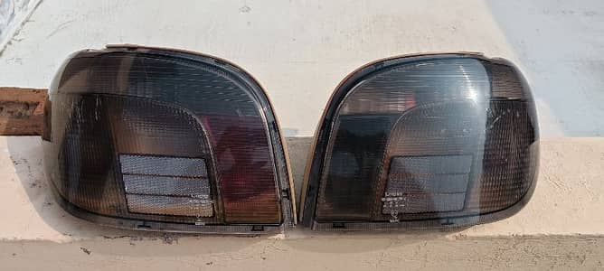 Vitz 99-2003 Smoked Taillights