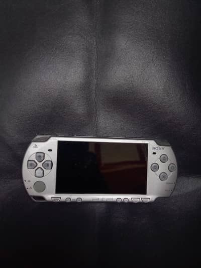 Playstation (Model 2000) only With charger