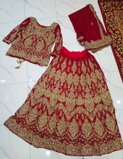 Beautiful Red Bridal Lehenga with Heavy Golden Embroidery